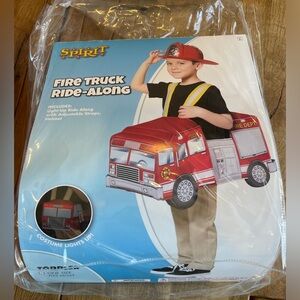 Spirit Halloween Light-Up Firetruck Piggyback Costume | Firefighter